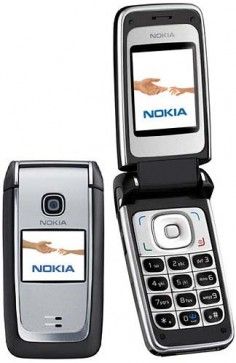 an old nokia cell phone with two hands on the front and one hand on the back