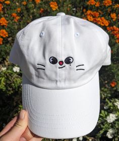 If you love Stray Kids and therefore Skzoo, this was made for you. Perhaps the CUTEST way to rep your bias in a subtle way. This is made from a 100% chino cotton twill white cap.  If you have more than one bias (which who doesn't), or want to match with someone else, I do have the whole skzoo collection up in my shop! Most members I have as both a cap and a bucket hat, so whatever you need, I have covered.  This product is made especially for you as soon as you place an order, which is why it takes us a bit longer to deliver it to you. Making products on demand instead of in bulk helps reduce overproduction, so thank you for making thoughtful purchasing decisions! Kpop Hat, Clear Phone Case Design, Stray Kids Outfits, Kpop Tshirt, Kids Bracelets, Hat Embroidery, Embroidery Shop, White Caps, Cute Notes