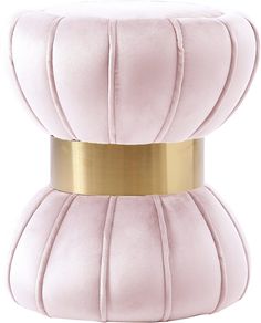 a pink and gold poufle sitting on top of each other