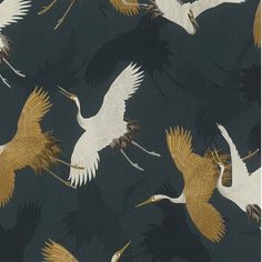 a flock of birds flying across a dark blue sky with white and gold accents on it