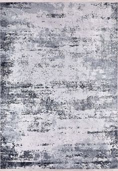 an area rug with grey and white colors