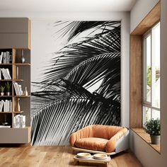 a living room with a palm tree mural on the wall and a chair in front of it