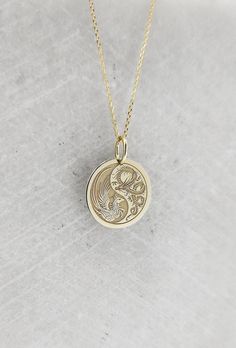 14K Real Solid Gold Necklace, Hallmarked on the back of your pendant for certification! ▪️ A beautiful and clean engraved Yin Yang Dragon Phoenix  pendant made out of 14K Solid Real Gold. Available only in yellow gold! Pendant Thickness: 0.50mm Jump Ring inner diameter: 4mm Dimensions: - 13mm / 0.52 inches - 15mm / 0.59 inches - 18mm / 0.70 inches - 20mm / 0.78 inches - 22mm / 0.86 inches - 24mm / 0.94 inches Necklace Length - You can choose your chain length from 35CM to 50CM. The pendant is av Symbolic Round Pendant Necklace With Engraving Option, Symbolic Necklace With Round Pendant And Engraving Option, Spiritual Round Pendant Jewelry With Engraving Option, Ancient Chinese Jewelry, Yin Yang Dragon, Yin Yang Charm, Phoenix Jewelry, Gold Pendent, Phoenix Necklace