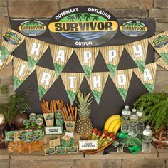 an outdoor birthday party with pineapples, bananas and other tropical items on display