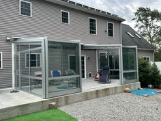 a house that has some glass doors on it