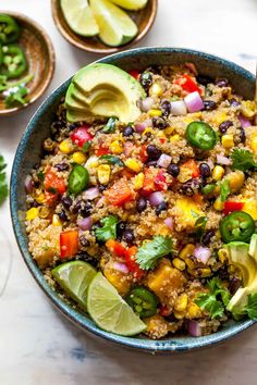 a bowl filled with mexican quisadilla and topped with avocado