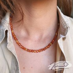 Embrace the vibrant energy of our Faceted Orange Carnelian choker, a stunning piece designed to enhance any outfit. This choker is perfect for gemstone enthusiasts who appreciate the healing properties and natural beauty of high-quality gemstones, combined with the elegance of minimalist jewelry. Key Features: *Material: Genuine Faceted Orange Carnelian Gemstone Beads (2~3 mm) *Necklace Size: Approximately 16 inches, adjustable with a 2-inch gold chain extender *Gold Spacer Beads: Adds a touch of luxury and perfectly complements the vibrant Carnelian stones *Crafted with Love and Care: Each necklace is thoughtfully handmade to ensure quality and uniqueness Additional Details: *Natural Variation: Colors may vary slightly due to different lighting and screen settings, and each bead has uniqu Carnelian Choker, Orange Carnelian, Carnelian Necklace, Vibrant Energy, Carnelian Stone, August Birthstone, Energy Stones, Chain Extenders, Necklace Size