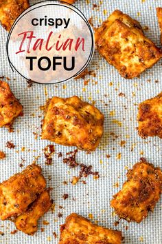 crispy italian tofu on a baking sheet with text overlay that reads crispy italian tofu