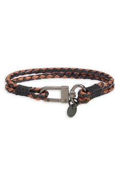 Rugged, two-tone braided straps secured by a dog clip clasp add the edginess you crave to a bracelet designed with refined craftsmanship that is suited for everyday wear. 7" circumference Leather/polyester/metal Imported Black Owned/Founded Men's Leather Bracelets Braided, Dog Clip, 20 Gifts, Mens Leather Bracelet, Braided Strap, Mens Leather, Mens Jewelry Bracelet, Top 20, Gifts For Men