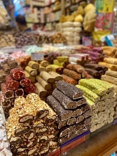 many different types of chocolates on display in a store