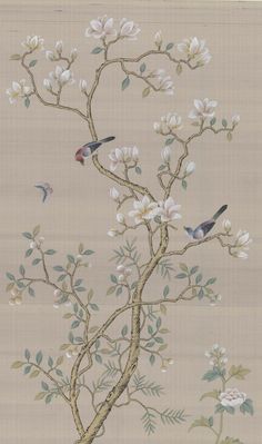 two birds sitting on top of a tree branch with white flowers and leaves in the background