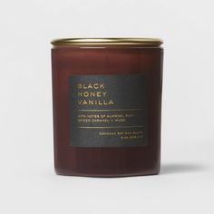 black honey vanilla candle on a white background