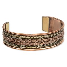 a copper cuff bracelet with braiding on the side and gold plated clasps