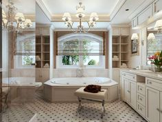 a bathroom with a large tub and chandelier