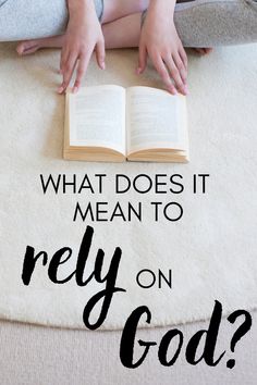 a person sitting on the floor reading a book with text overlay that reads, what does it mean to rely on god?