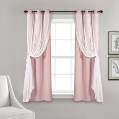 a white chair sitting in front of a window with pink curtains on the windowsill