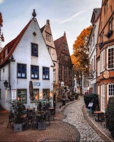 a cobblestone street in an old european town