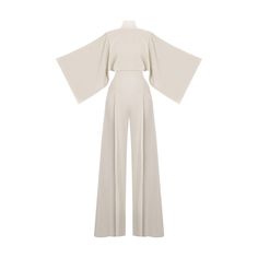 IO Jumpsuit features an exaggerated wide leg, pleat front detail and a high waist perfectly balanced out with traditionally tailored Kimono style sleeves and a high neck with 3 button closures at the back of the neck and an elegant open back. Dry clean or cold hand wash Graduation Outfit Ideas Hijab, Runway Jumpsuit, White Jumpsuit Outfit, Hijab Jumpsuit, Kimono Jumpsuit, Elegant Bodysuit, Lit Outfits, White Lily, Graduation Outfit