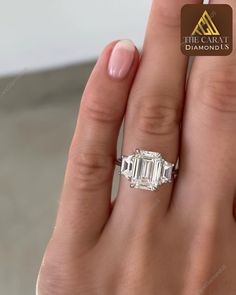 Elevate your love story with our stunning 3.00 CT Emerald Cut Moissanite Engagement Ring, a masterpiece that sparkles with brilliance and sophistication. Crafted from high-quality 14K gold, this exquisite three-stone ring symbolizes your journey together, making it a perfect wedding or anniversary gift. The striking emerald cut captures the light beautifully, while the personalized touch of handmade craftsmanship ensures that this ring is as unique as your bond. Imagine the joy on your partner's Three Emerald Engagement Ring, Rectangle Engagement Rings, Emerald Cut Moissanite Engagement Ring, Radiant Cut Rings, Handmade Personalized Gifts, Stone Wedding, Emerald Cut Moissanite, Wedding Anniversary Gift, Emerald Engagement Ring