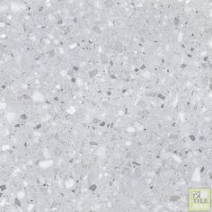 an image of a white marble floor with grey and silver speckles on it