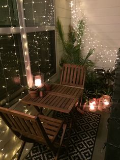 an outdoor patio with lights and chairs