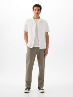 Soft linen-cotton trousers.  Button closure, zip fly.  Front slant pockets.  Back welt pockets.  * Fit: Slim.  A semi-fitted silhouette that sits close to the body at the waist & hip, with a slight ease through the knee & ankle.  Mid rise.  Models are 6'1"–6'2" 185-188 cm) with a 31" 79 cm) waist and 32–33" 81–84 cm) inseam, and are wearing Gap Cotton Linen Trousers, Laurel Wreath, Slim Fit Trousers, The Gap, Welt Pocket, Linen Blend, Casual Pants, Gap, Trousers