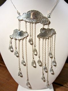 Sold!!!!!!!!!!!!!!!!    WHEN IT RAINS......sterling silver  cloud necklace. Clouds Jewelry, Futurism Fashion, Rain Jewelry, Cloud Necklace, Silver Cloud, Silver Chains, When It Rains, Blue Quartz, Rain Drops