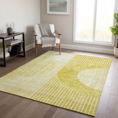 a living room with a yellow rug and chair