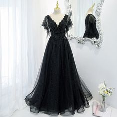 V-neck Evening Gown For Banquet, Black V-neck Gown For Banquet, Black A-line Tulle Evening Dress, A-line Tulle Ball Gown For Party, A-line Tulle Ball Gown For Evening, V-neck Dress For Evening And Prom Season, V-neck Ball Gown For Prom Season Evening, V-neck Evening Gown For Prom Season, V-neck Ball Gown For Prom Evening