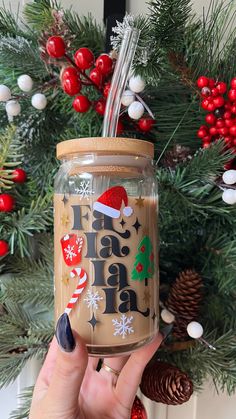 a hand holding a mason jar with christmas decorations on it and the words fab fab fab