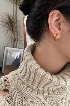 Get ready to double up your style game with the Laine hoops Faux Double Piercing Huggie Earrings! These earrings are the perfect way to add some sass to your look without the need for extra piercings. Crafted from premium 18K gold and super-strong 316L stainless steel, these earrings are as durable as they are chic. The huggie-style hoops are comfy enough to wear all day long, so you can strut your stuff in style. The best part? These earrings are totally sweat and water-resistant, so you can we Trendy Small Hoop Gold-plated Earrings, Trendy Small Hoop Gold Plated Earrings, Trendy Hypoallergenic Gold Plated Hoop Earrings, Trendy Small Hoop Gold Wrap Earrings, Gold Small Hoop Wrap Earrings Trendy, Trendy Hoop Clip-on Earrings, Hoop Metal Cartilage Earrings, Gold Metal Piercings, Trendy Everyday Hoop Clip-on Earrings