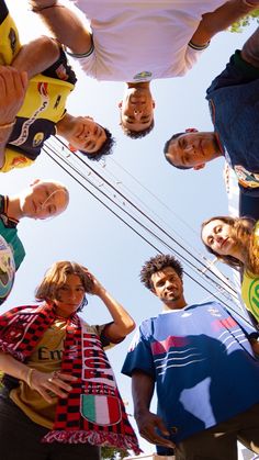 a group of people standing in a circle