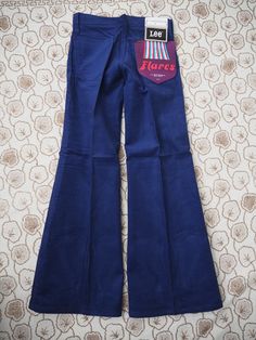 Amazing pair of vintage corduroy pants in deep rich blue with a low rise, slim fit and flared legs. Sourced locally from a closed down jeans store, these pants still have the original Lee manufacturing tag from the 1960s! The corduroy fabric is made from 100% cotton in Belgium and the pants close with a talon 42 zipper and Lee button. We recommend that you buy your fit by following these measurements, Waist: 66cm / 26'' Front rise: 21cm / 8'' Seat: 89cm / 35'' Inseam: 76cm / 30'' Label size W26 Blue Flare Pants, Flared Corduroy Pants, Vintage Corduroy Pants, Jeans Store, Vintage Corduroy, Blue Corduroy, Corduroy Fabric, Wide Legs, Corduroy Pants