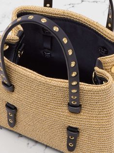 Luxury Beige Straw Bag With Gold-tone Hardware, Luxury Straw Bag With Gold-tone Hardware, Luxury Gold Straw Bag With Braided Handles, Luxury Natural Straw Bag With Gold-tone Hardware, Luxury Straw Bags With Gold-tone Hardware, Designer Natural Straw Bag With Gold-tone Hardware, Luxury Gold Straw Bag For Vacation, Designer Straw Bag With Gold-tone Hardware, Designer Summer Straw Bag With Detachable Strap