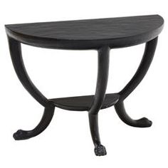 a black table with an oval shaped top