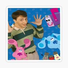 a young man standing in front of a blue background with cut outs of cartoon characters