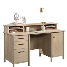 an office desk with two drawers and a lamp on it's side, against a white background