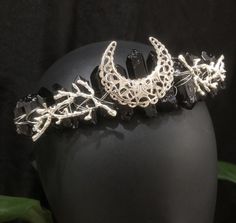 Handmade Black Crystal Moon Crown,Crystal Quartz Tiara,Quartz Crown,Mermaid Crown,Wedding Tiara Bridal Festival Hair Accessories Gemstone Handmade Crystal Crown,Crystal Quartz Tiara,Quartz Crown,Mermaid Crown,Wedding Tiara Bridal Festival Hair Accessories Gemstone  Each one is Handmade and the Design varies to make it Unique and One of a kind for you - Quartz crystals symbolize harmony, serenity, inner peace and healing, as well as the releasing of negativity and past problems. It is said to be Quartz Tiara, Moon Crown, Quartz Crown, Festival Hair Accessories, Crown Crystal, Mermaid Crown, Bridesmaid Hair Accessories, Crystal Moon, Headpiece Jewelry