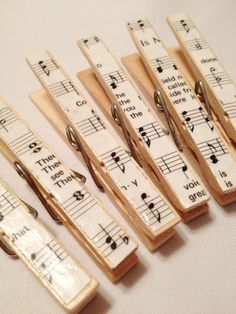 wooden clothes pins with musical notes on them