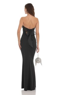 Back Bow Strapless Maxi Dress in Black | LUCY IN THE SKY Black Wedding Guest Dresses, Black Tie Wedding Guest Dress, Black Tie Wedding Guests, Strapless Prom Dresses, Lucy In The Sky, Unique Prom Dresses, Black Dress Formal, Black Strapless Dress, Prom Dress Inspiration