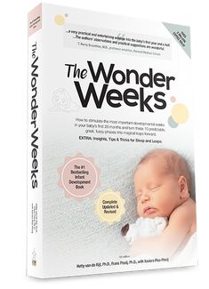 the wonder weeks book is open to reveal a baby's first photo and its name