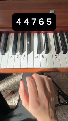 someone is playing the piano with their fingers