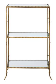 a gold metal shelf with glass shelves on each side and two shelves below the shelf