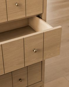 a close up view of the drawers on a dresser