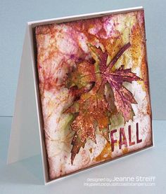 a card with an autumn leaf on it and the word fall written in red ink