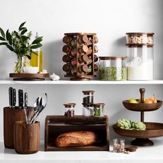 kitchen utensils and food items displayed on shelves