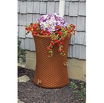 an outdoor planter with flowers in it