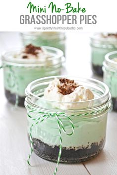 mini no - bake grasshopper pies in glass jars with green ribbon on top