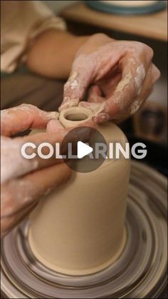 someone is making a vase out of clay on a potter's wheel with their hands