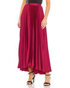 Transform your evening look with our Long Pleated Satin Maxi Skirt. This skirt is perfect for black-tie events, galas, or formal charity fundraisers. Pair it with a sophisticated blouse or top and elegant accessories for a regal look. Mac Duggal Satin Fabric (100% polyester) Fully lined Pleated detailing Back zipper Approx. length: Front: 38.5" | Back: 43" Available in Black, Peacock, and Fuchsia Style #R26760 Prom Dresses Corset, Satin Pleated Skirt, Emerald Bridesmaid Dresses, Tea Length Skirt, Color Peacock, Satin Maxi Skirt, Colorful Dresses Formal, Evening Skirts, Sequin Formal Dress